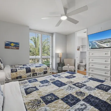 Beautiful End Unit Single Level Condo North Coast Village - Walk to the beach!!