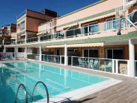 Golden Beach n. 12, Top Floor Apartment with Private Roof Terrace by El Sirocco