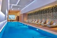 希爾頓逸林沙迦濱水飯店及公寓 - 沙灘