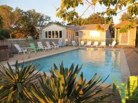 Soundfront Sunsets with Private Dock, Kayaks, Large Pool, Hot Tub, Guesthouse