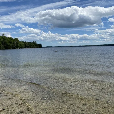 Beautiful private beach area within steps from the modern updated log home