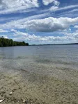 Beautiful private beach area within steps from the modern updated log home