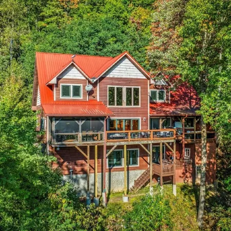 Stunning Views • Hot Tub • Sauna • Theater • Game Rooms • Sleep/Dine 23 •Firepit