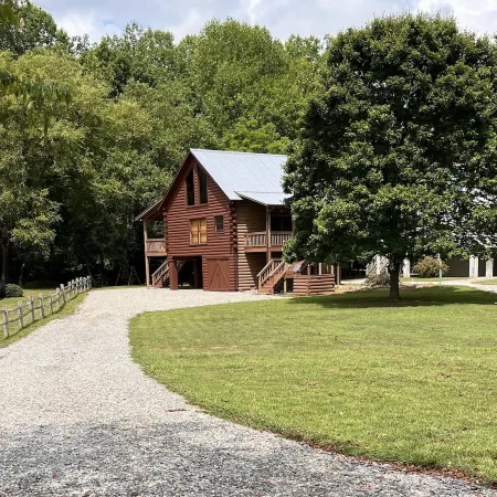 Riverfront Log Cabin with Hot Tub-Tubing on the River, Pet Friendly.