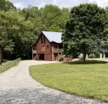 Riverfront Log Cabin with Hot Tub-Tubing on the River, Pet Friendly.