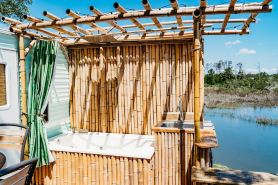 Cozy waterfront bamboo retreat, perfect for fishermen or outdoor enthusiasts