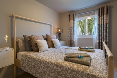 Luxurious B2 in a small complex with communal heated pool 100m from the sea