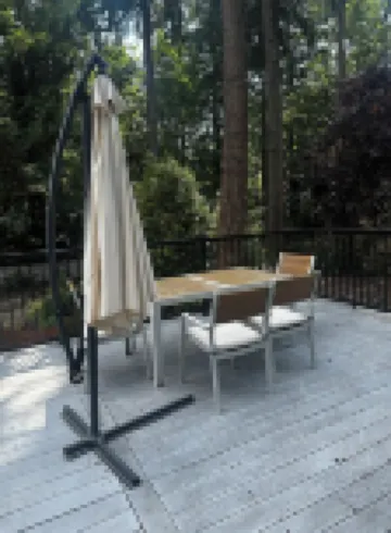 Unit surrounded by treesWasher and Dryer + Pet friendly!