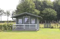 Child-friendly with terrace, large garden and playground equipment