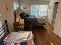 Cozy Cottage with access to and partially obstructed views of the bay.