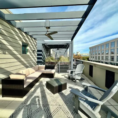 Luxury condo. 2 car garage, rooftop patio. Perfect for work or play!