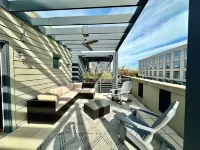 Luxury condo. 2 car garage, rooftop patio. Perfect for work or play!