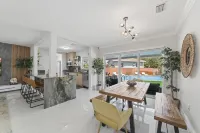 Fun 5BR Retreat w/Pool, Beach, Games & BBQ