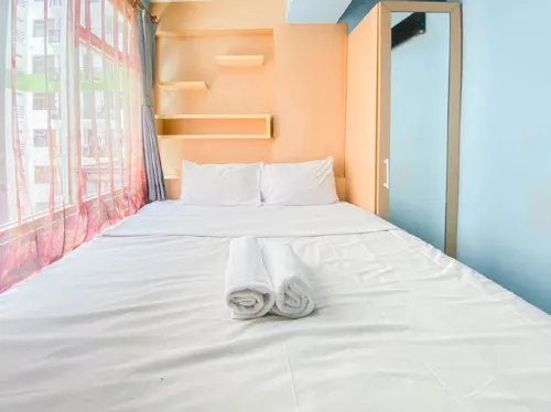 Homey Living 2BR at Jarrdin Cihampelas Apartment By Travelio