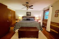 Robin's Nest is an authentic log cabin built with hand-hewn logs from the 1800's