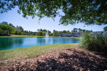 Beautiful 2 bed 2 bath Corner Unit with golf course view-5 minutes from beach