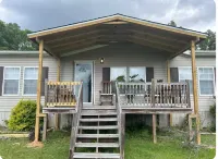 Cozy 3-bedroom mobile home in delightful Magnolia with AC, WiFi