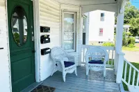 Centrally located off Back Cove, 1st floor 4 bedroom, 1.5 Bath condo w/ porch