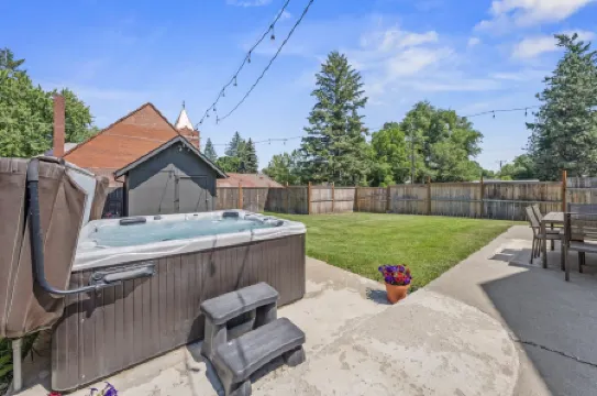 Charming Escape with Hot Tub and Fenced Yard - Stylish Retreat
