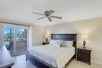 Spacious Balcony and Access to Docks - Charming Coastal Oasis