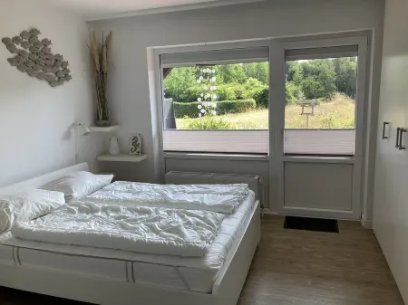 Spacious beach apartment in a quiet location with pool and sauna