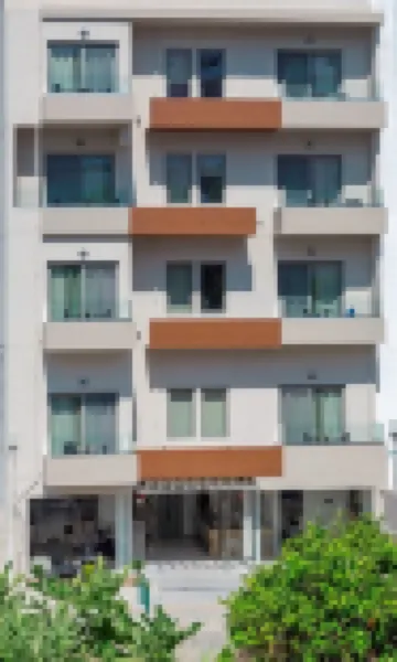 The City Hotel & Suites