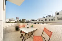 Bright 1Br Apartment w Balcony 10 Min Walk from Beach with Mamad by Sea N' Rent