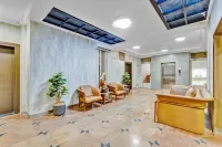 Blossoms Hotel and Service Apartment