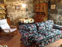 Rural house of the 18th century, overlooking the Aldán estuary.