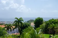 BACK TO BUSINESS Golf Cart,Swimming Pool, generator & Breathless Scenic Views! Candelero Abajo 호텔