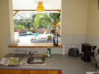 Villa F3 in the heart of the island, with swimming pool and Creole garden