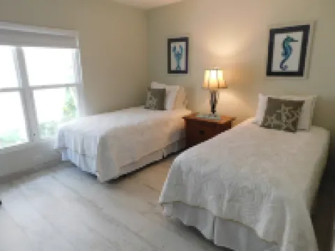 Stunning beachfront condo next to restaurant & a short drive to famous RumPoint