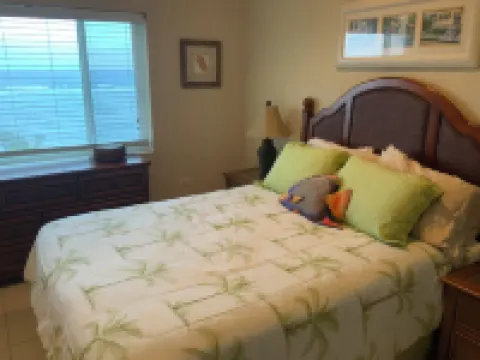 Beachfront Peace!  Awesome top floor condo on Caribbean plus military discount! Hotels in North Side