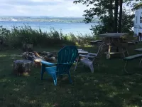 Get lulled to sleep by Lake Superior in Vintage camper 5 steps from the water