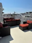 TOP FLOOR, BIG 4 BEDROOM, 2 BATH BEAUTY!ONLY 1.5 BLOCKS TO THE BEACH AND BOARDS!