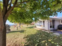 SUNRISE BAY has a panoramic view of Lake Erie with a private beach.