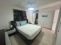 Air-conditioned 1 bed 1 full bath 1 half bath apartment.  Hot Water & generator.