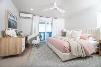 Windward Breeze – Walk to Beach!