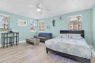 Cozy St. Pete Beach condo - Steps to the beach & sunsets + Heated pool