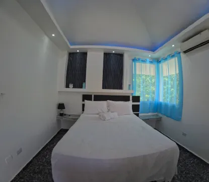 Condo with private balcony in the heart of Sosua Отели рядом с достопримечательностью «Плайя Алисия»