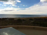 large terrace overlooking the sea and the sand dunes