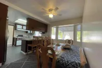 Cheerful 6 bedroom home with indoor fireplace.