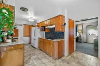 Welcoming 2-bedroom home with large deck and central location.