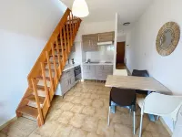 Feet in the water in Corsica Hotels in Alata