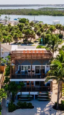 30 Seconds to Beach Path! Tiki Bar with Outdoor TV! Bikes, Kayaks, Sups & More!