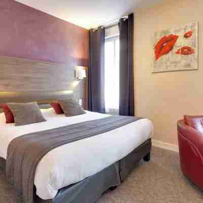 Brit Hotel Le Cygne Rooms