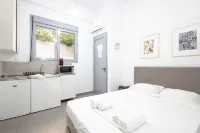 บ้าน 4 ห้องนอน ใกล้สวนดาดฟ้า อโครโพลิส สำหรับ 12 คน พร้อมจากุซซี่ - บังกะโล