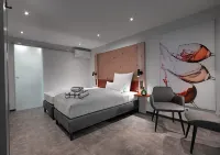WeinMotel Simon 1 a Отели в г. Альценау