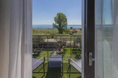 Insula Felix - Deluxe Triple Room with Sea View