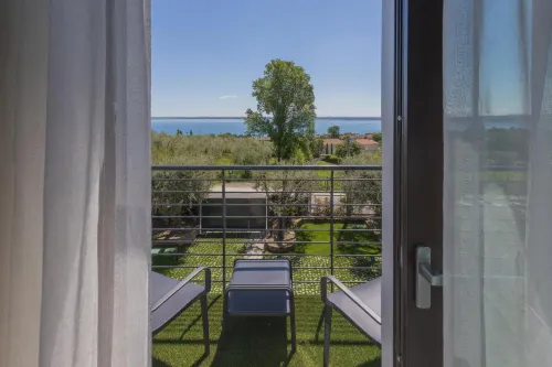 Insula Felix - Camera Tripla Deluxe con Vista Mare